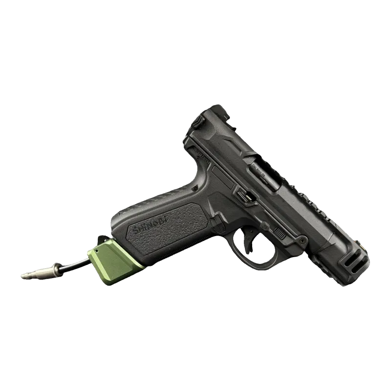 Pistolet AAP-01 équipé de l'adaptateur HPA Airtac T1P à talon vert, vue de profil