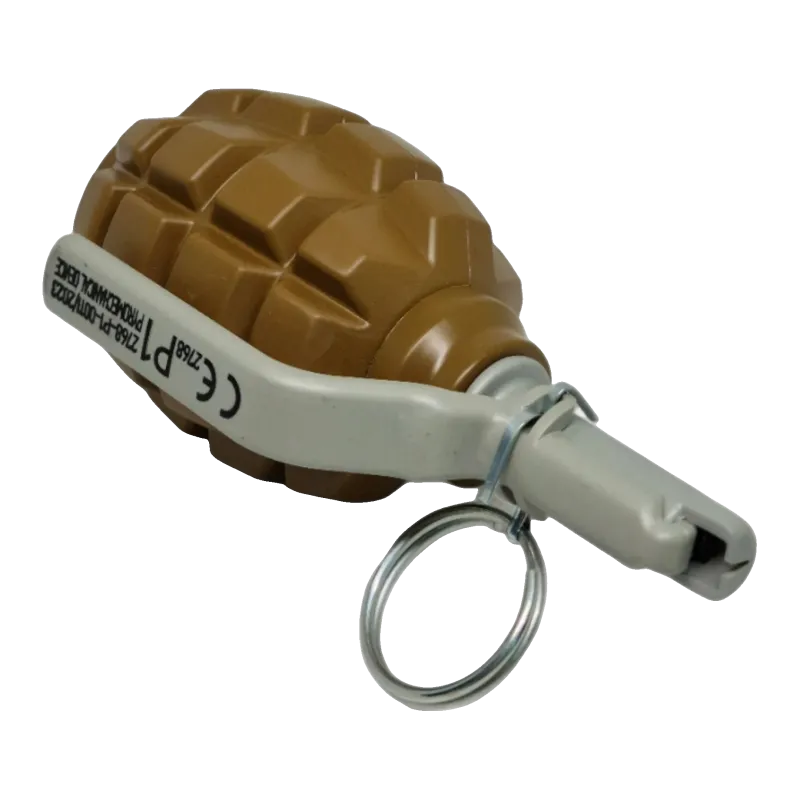 Grenade Pyrosoft PIRO-F1-G couchée, levier marqué CE P1 et anneau de goupille
