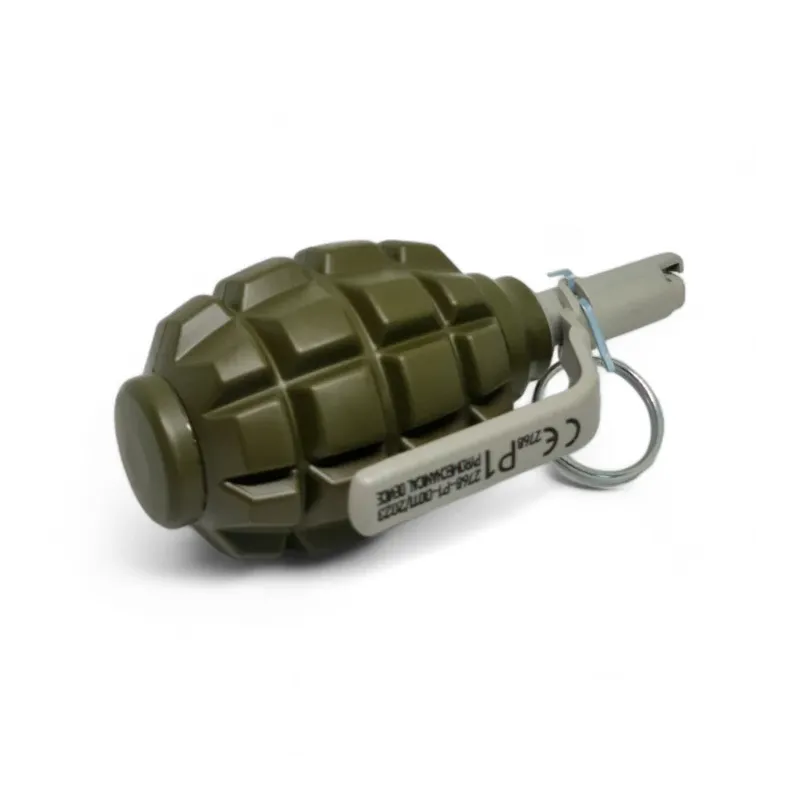 Grenade Pyrosoft PIRO-F1-M couchée, marquage CE P1 visible sur le levier