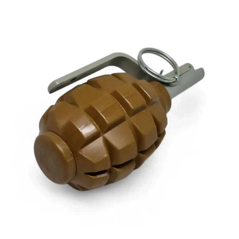 Grenade Pyrosoft PIRO-F1-G couchée, vue côté culot avec levier et anneau
