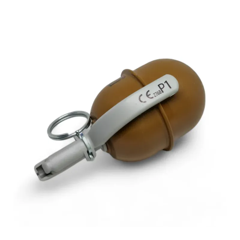 Grenade Pyrosoft PIRO-5G couchée, levier marqué CE P1 et anneau de goupille