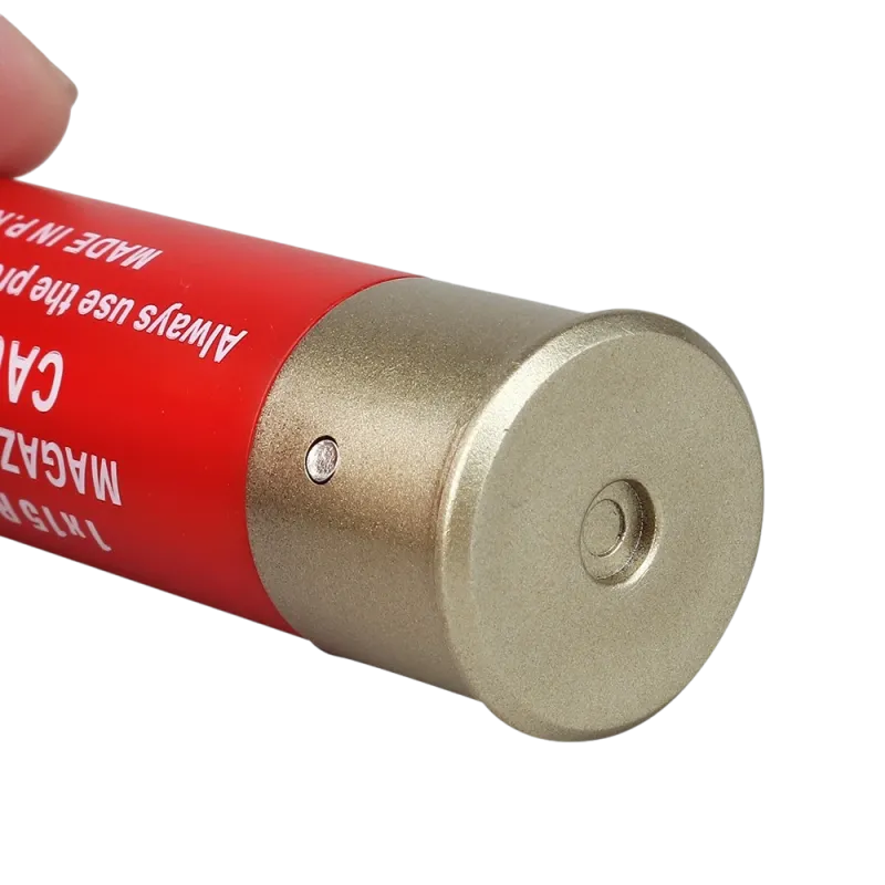 Cartouche rouge Wosport pour fusil à pompe airsoft, culot doré en gros plan