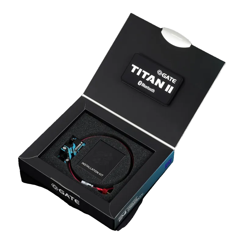 Boîte ouverte du Gate Titan II Bluetooth : module, faisceau, kit d'installation et patch