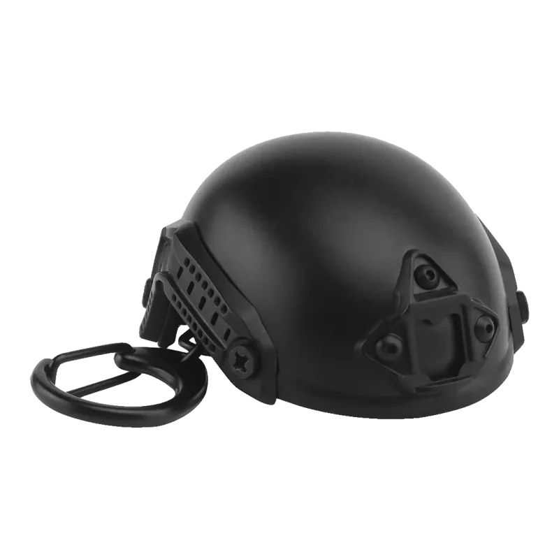 Porte-clés casque FAST noir avec mousqueton, vue de trois quarts côté rails et support NVG