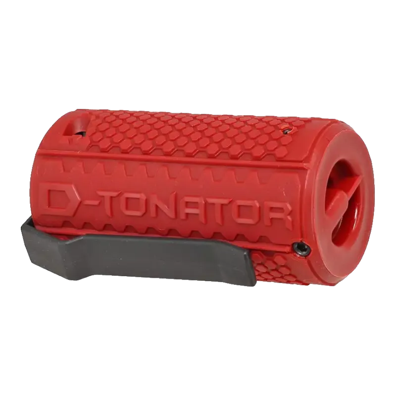Grenade ASG D-Tonator rouge couchée, marquage D-Tonator et trou de projection