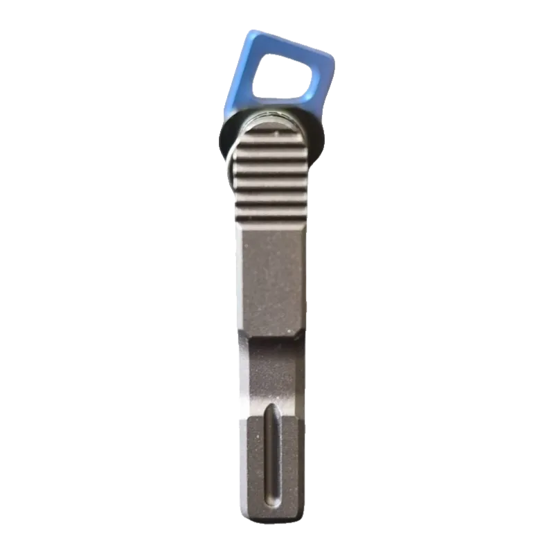 Bouton d'éjection chargeur ambidextre, détail de l'appui strié du levier gris